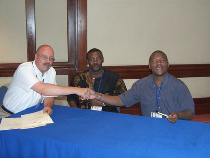 Signing the NDA between RIPE NCC and AfriNIC Signing the NDA between RIPE NCC and AfriNIC