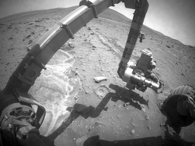 The NASA rovers Opportunity and Spirit land safely on Mars and begin mankind's first-ever field geological study of another planet