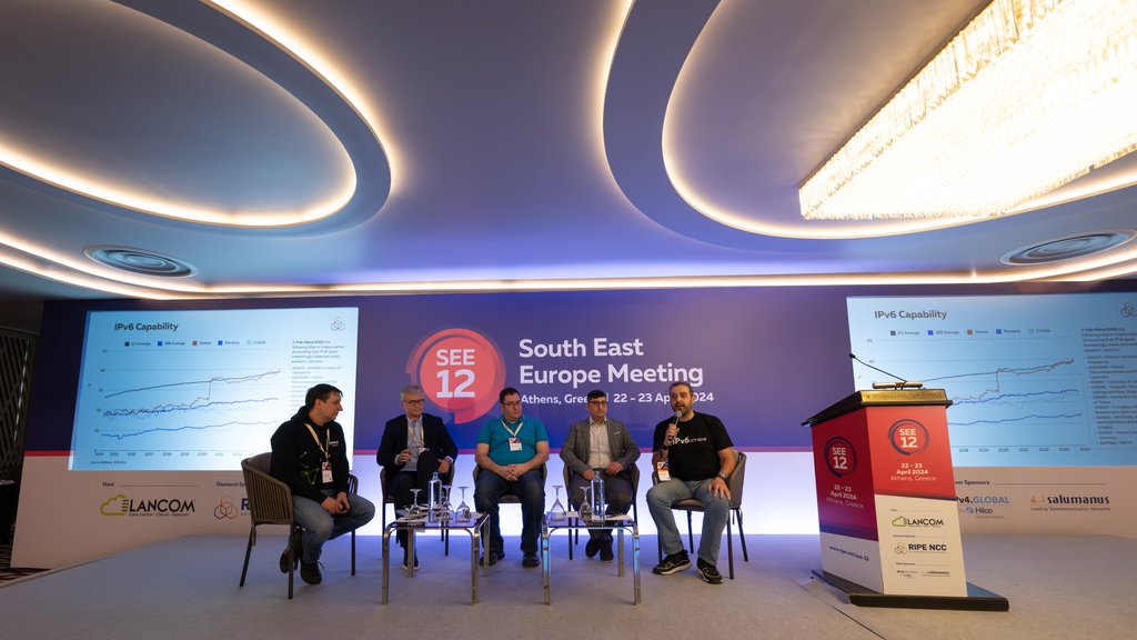 Photo of Vasja Križmančič, Pavle Mijušković (EKIP), Georgios Manousakis (OTE), Qasim Lone (RIPE NCC), Hisham Ibrahim (moderator)